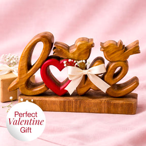 Hand-carved wooden sculpture titled Amber Affection by LAY016, decorative wooden décor for home art display.