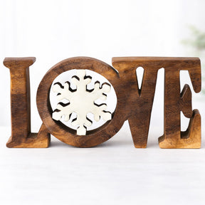 Hand-carved wooden sculpture titled Endless Love, a handmade decorative wooden décor piece showcasing intricate craftsmanship.