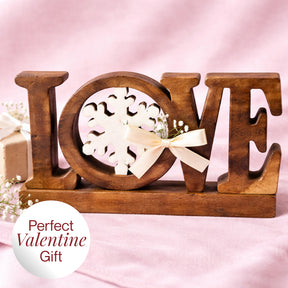 Hand-carved wooden sculpture titled Endless Love by LAY031, a handmade decorative wooden décor piece for home art.
