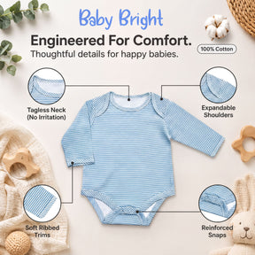 The image is an advertisement for a baby outfit, specifically a blue and white striped onesie. It features a close-up view of the outfit, highlighting its features such as the tagless neck, expandable shoulders, soft ribbed trim, reinforced snaps, and 100% cotton material.