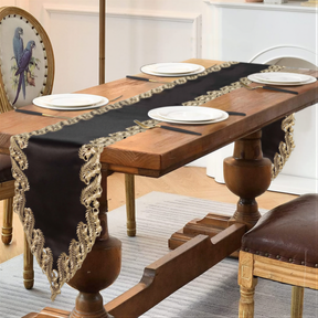 Elegant black and gold table runner from the Ebony Bloom collection, decorative 14x108 inch fabric for stylish table decor.