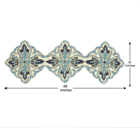 a decorative table runner with a floral pattern in shades of blue and white. The runner is approximately 36 inches long.