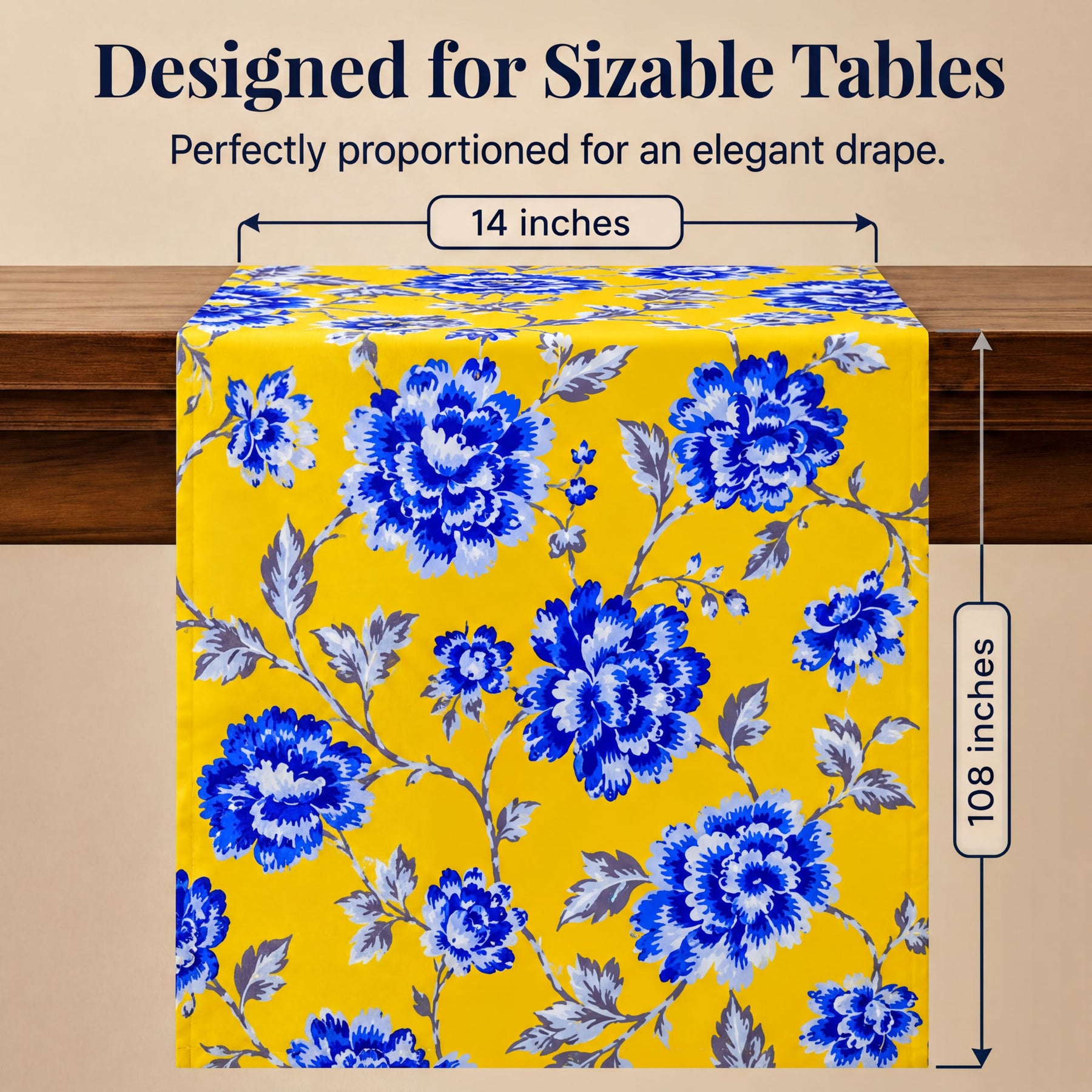 a table runner with a floral pattern in shades of yellow and blue. The runner is described as "Designed for Sizable Tables" and "Perfectly proportioned for an elegant drape." The runner is 14 inches long, as indicated by the text.