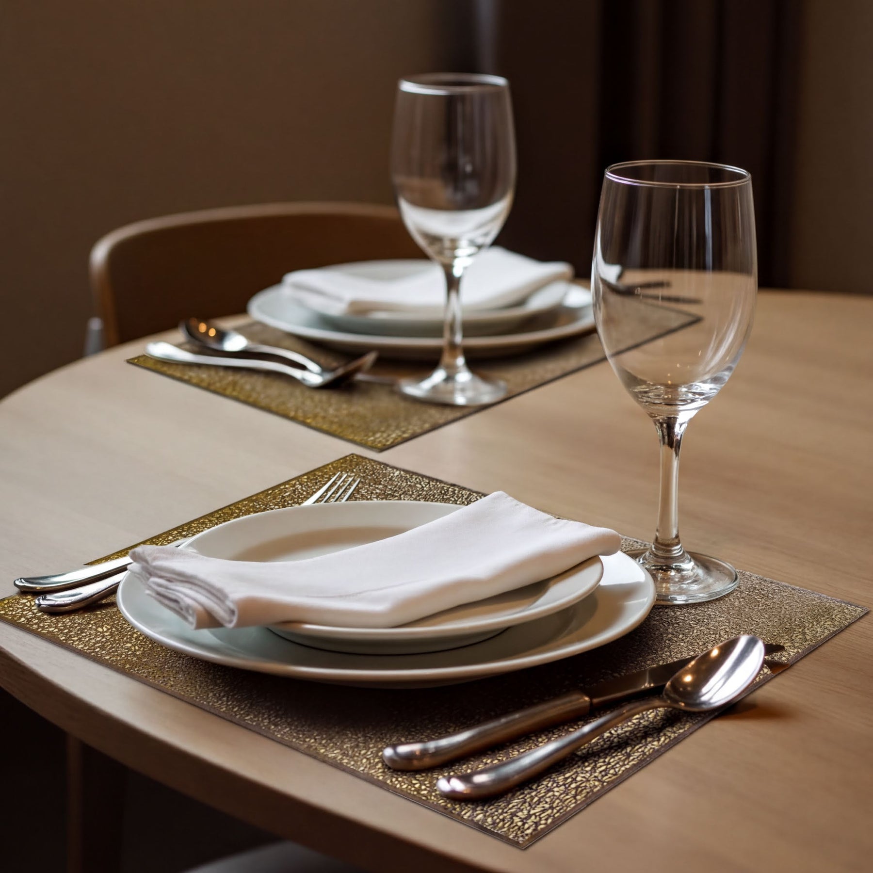 Set of 6 gold PVC cut-out placemats with intricate designs, ideal for protecting tables and enhancing dining decor.