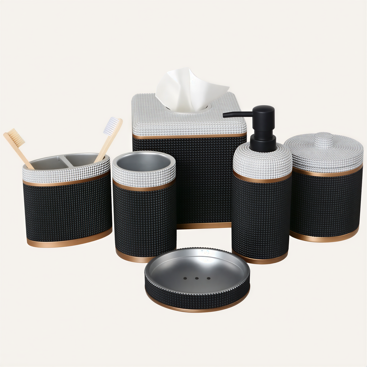 A set of black and white bathroom accessories, including a tissue box, soap dispenser, toothbrush holder, and other small containers.