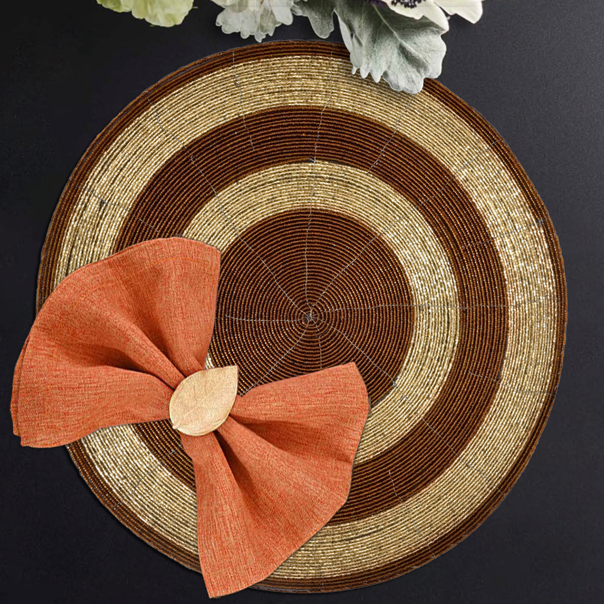 Set of four Dillen Grace beaded placemats from The Dillen Collection, decorative 14-inch table decor with elegant beaded design.