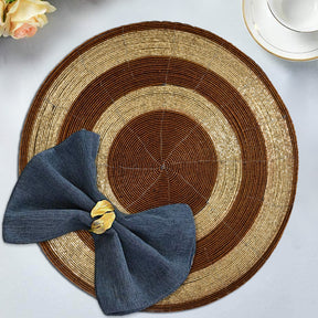 Set of four Dillen Grace beaded placemats from The Dillen Collection, elegant 14-inch decorative dining table placemats.