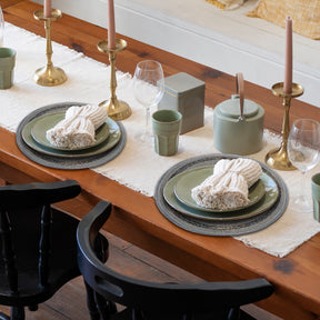 Set of four Vaiga Grace beaded placemats from The Vaiga Collection, decorative 14-inch table decor for elegant dining.