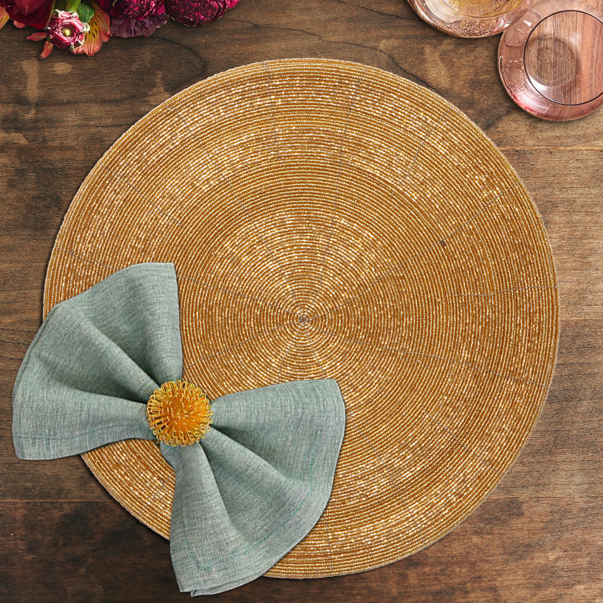 Set of four Hartfo Bloom beaded placemats from the Hartfo Collection, decorative 14-inch dining table decor with artistic beaded design.