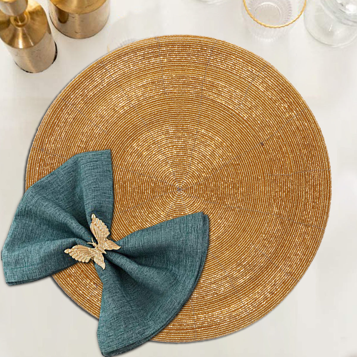 Set of four Hartfo Bloom beaded placemats from The Hartfo Collection, decorative 14-inch table décor with artistic beaded design.