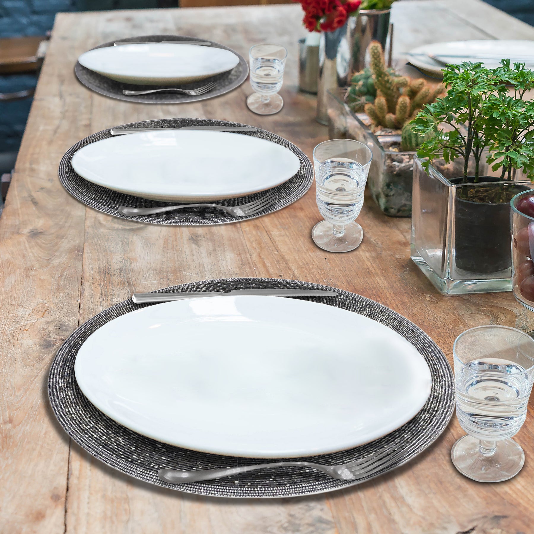 Set of four BD 036 037 beaded placemats featuring intricate beadwork, perfect for stylish table settings.