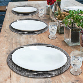 Set of four BD 036 037 beaded placemats featuring intricate beadwork, perfect for stylish table settings.