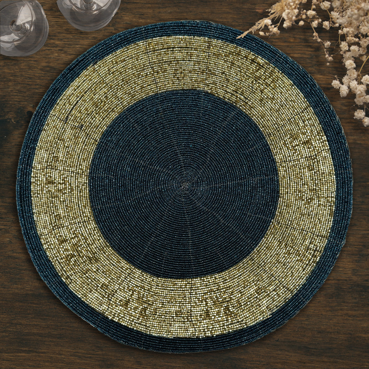 Set of four BD 036 043 beaded placemats featuring dark blue and gold round design, heat-resistant, 14-inch diameter.
