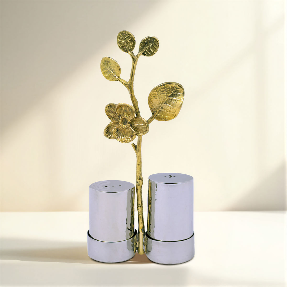 Salt and pepper shaker set in ceramic kitchen décor, featuring stylish black and white design from the 25083RLF brand.