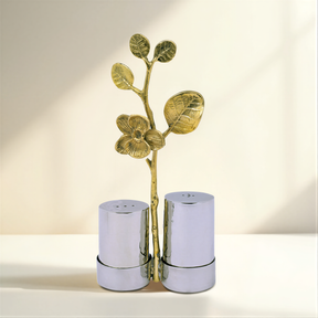 Salt and pepper shaker set in ceramic kitchen décor, featuring stylish black and white design from the 25083RLF brand.