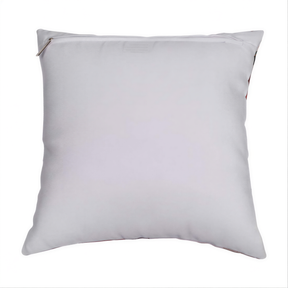 A plain white pillow with a zipper closure.