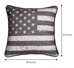 A square throw pillow with a black and white American flag design, along with measurements indicating it is 18 inches in length.