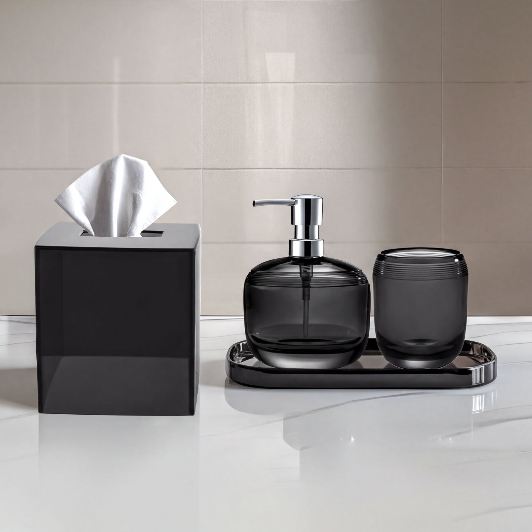 Elegant modern bathroom décor accessories set of 4 from The Aurik Collection, including soap dispenser, toothbrush holder, and matching accessories.