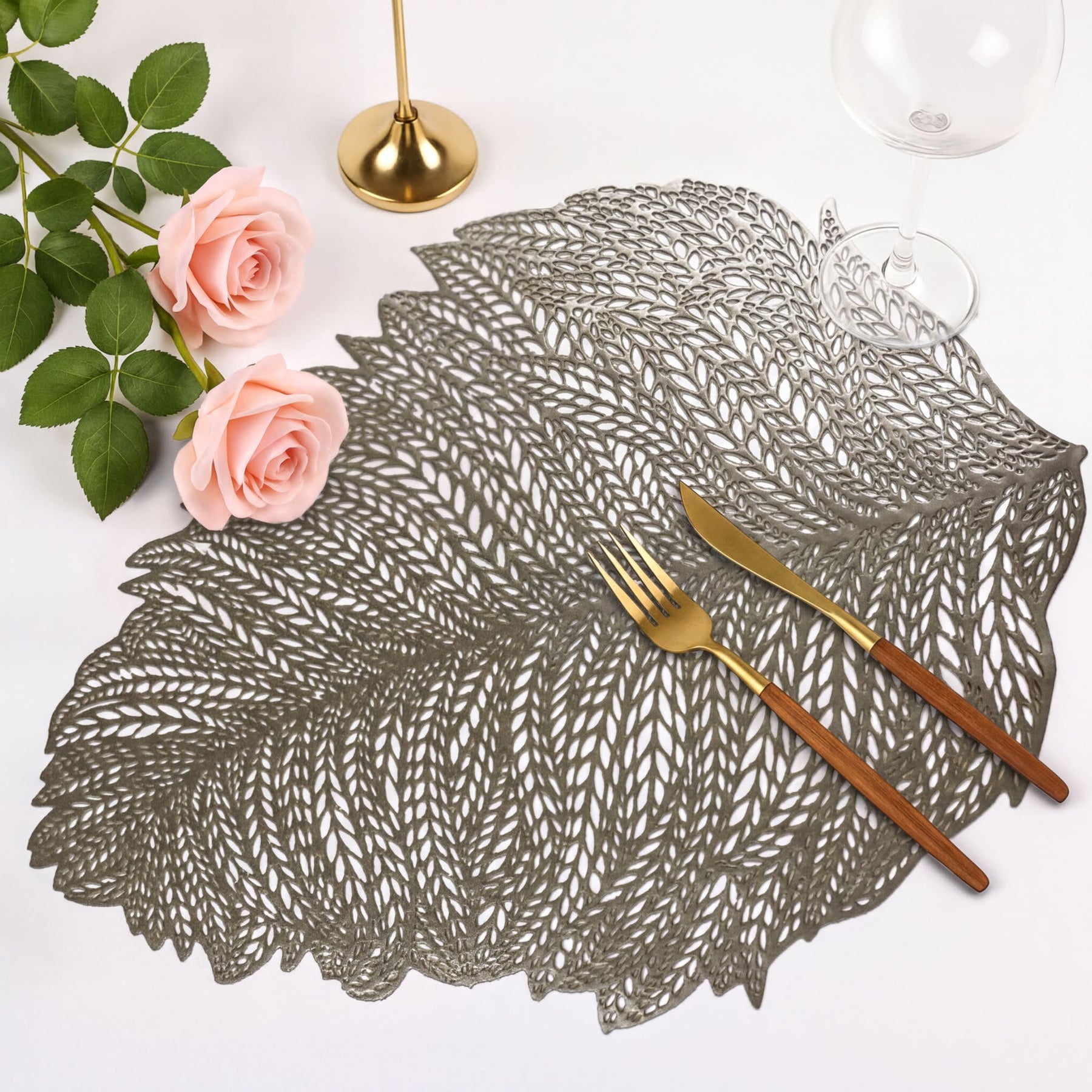 Set of six leaf cut out vinyl placemats by AMF033-GLD, decorative table protectors with intricate leaf design.