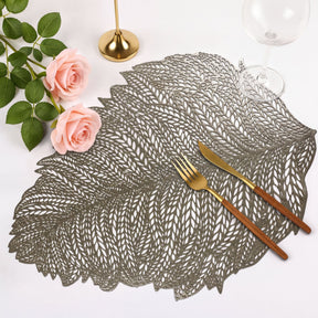 Set of six leaf cut out vinyl placemats by AMF033-GLD, decorative table protectors with intricate leaf design.