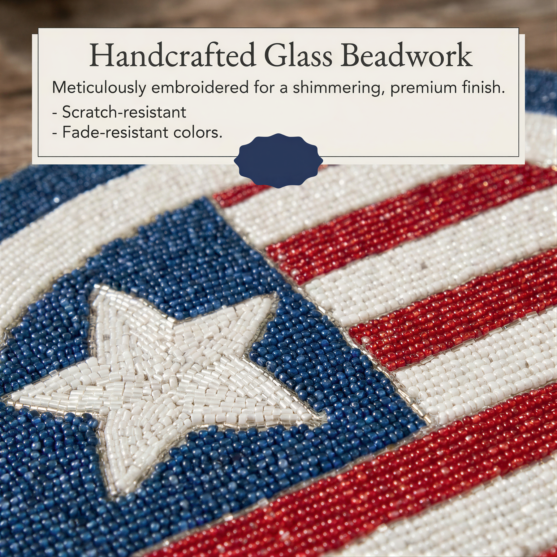 a close-up view of a handcrafted glass beadwork piece, which appears to be a beaded design resembling the American flag. The piece is meticulously embroidered with a shimmering, premium finish, and the colors are fade-resistant.