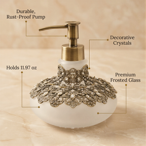A decorative soap dispenser with a gold pump and a white body adorned with intricate designs.