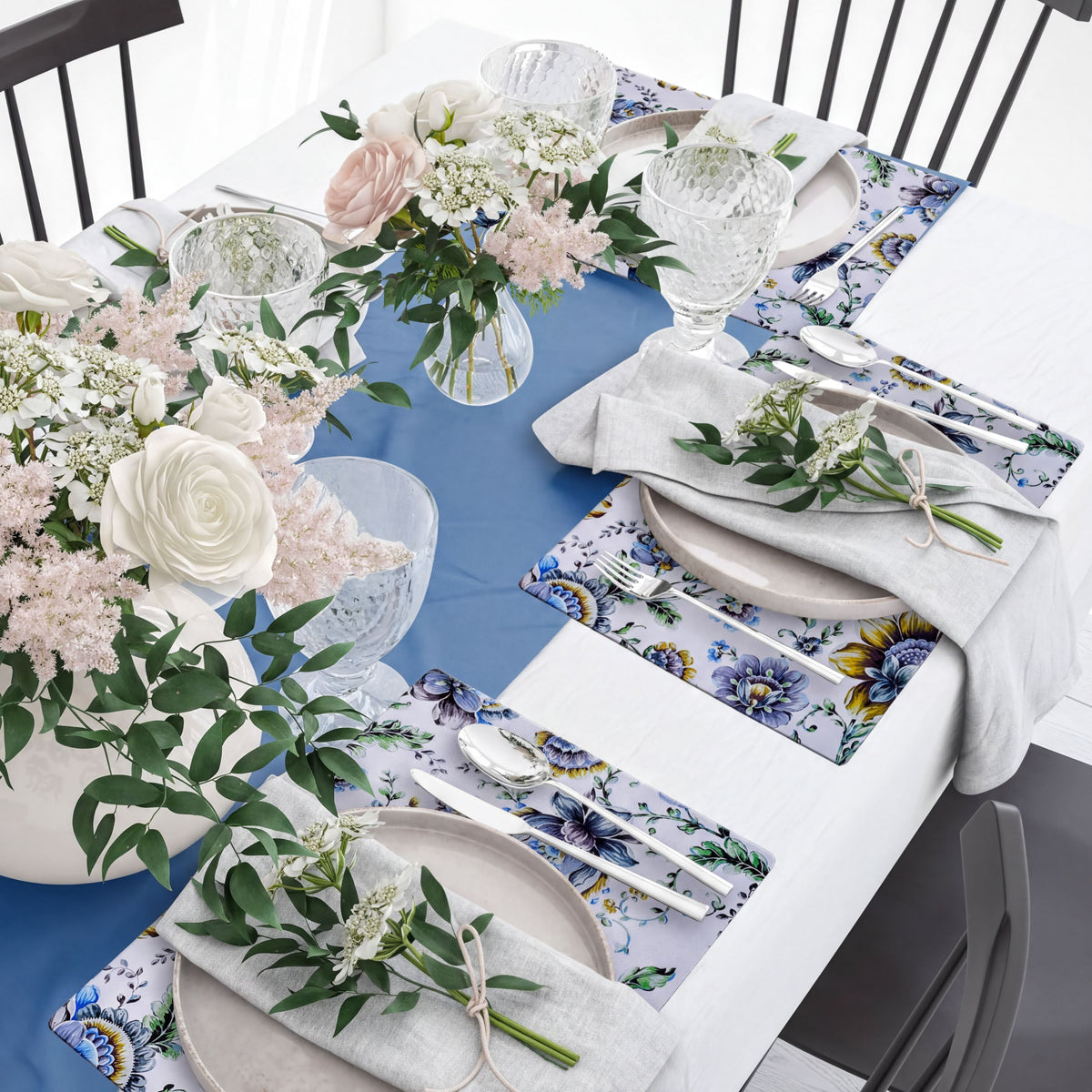 Set of four floral design cork-backed placemats by ATKP-9CK, decorative and protective for dining tables.
