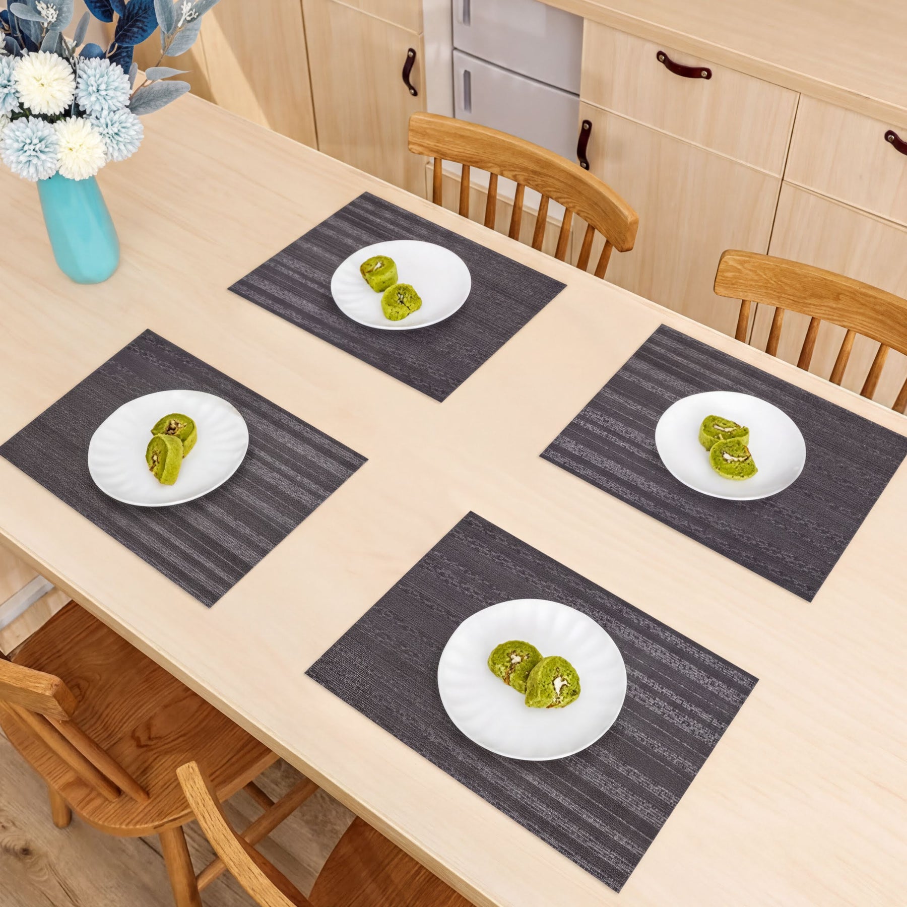 Set of four PVC placemats for dining table by 81811, featuring durable, stylish surface for protecting and decorating your table.