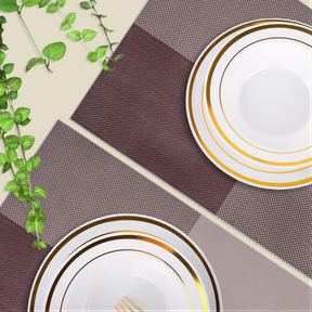 Set of four PVC Louvre placemats, heat-resistant table protectors, ideal for kitchen decor and dining surfaces.