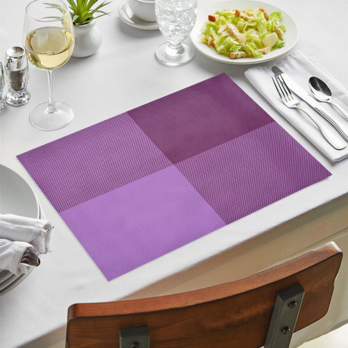 Pink and purple PVC placemats by 22255, heat-resistant, washable vinyl table protectors, suitable for indoor and outdoor use.