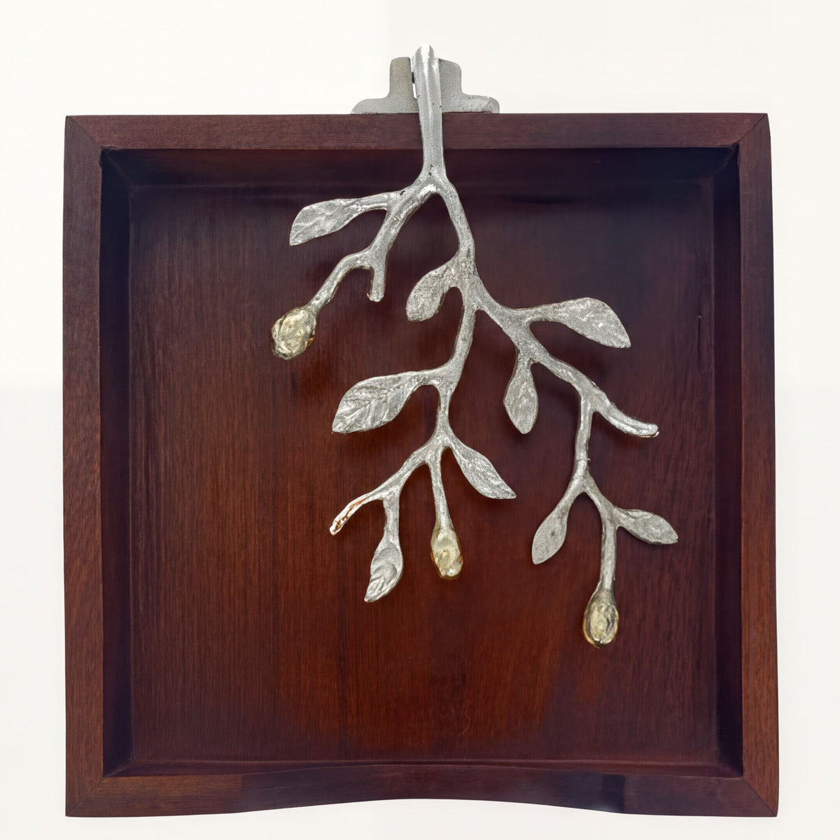 Solid wood napkin holder with silver and gold finish ornament, elegant design for stylish table settings.