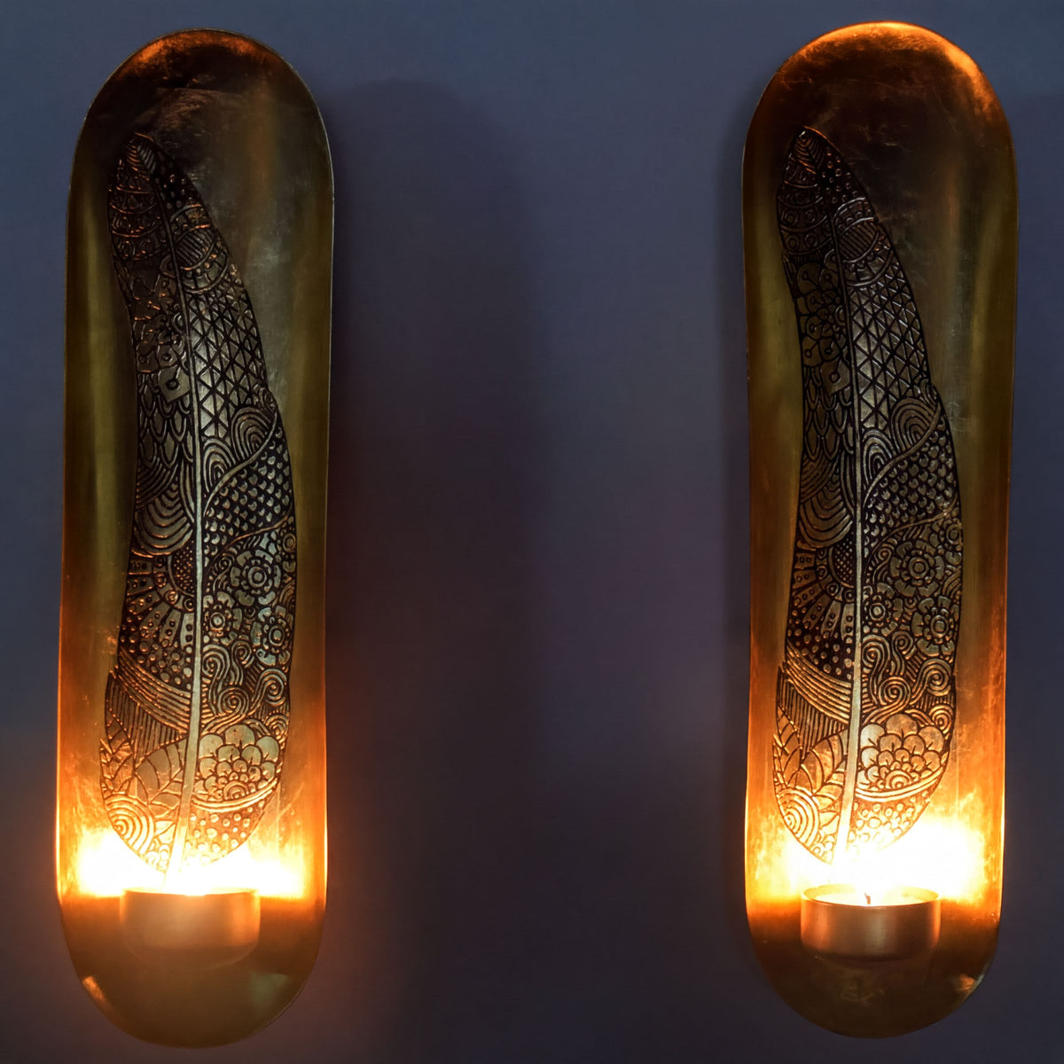 Set of 2 gold wall candle sconces with feather design, decorative candle holders for elegant home decor.