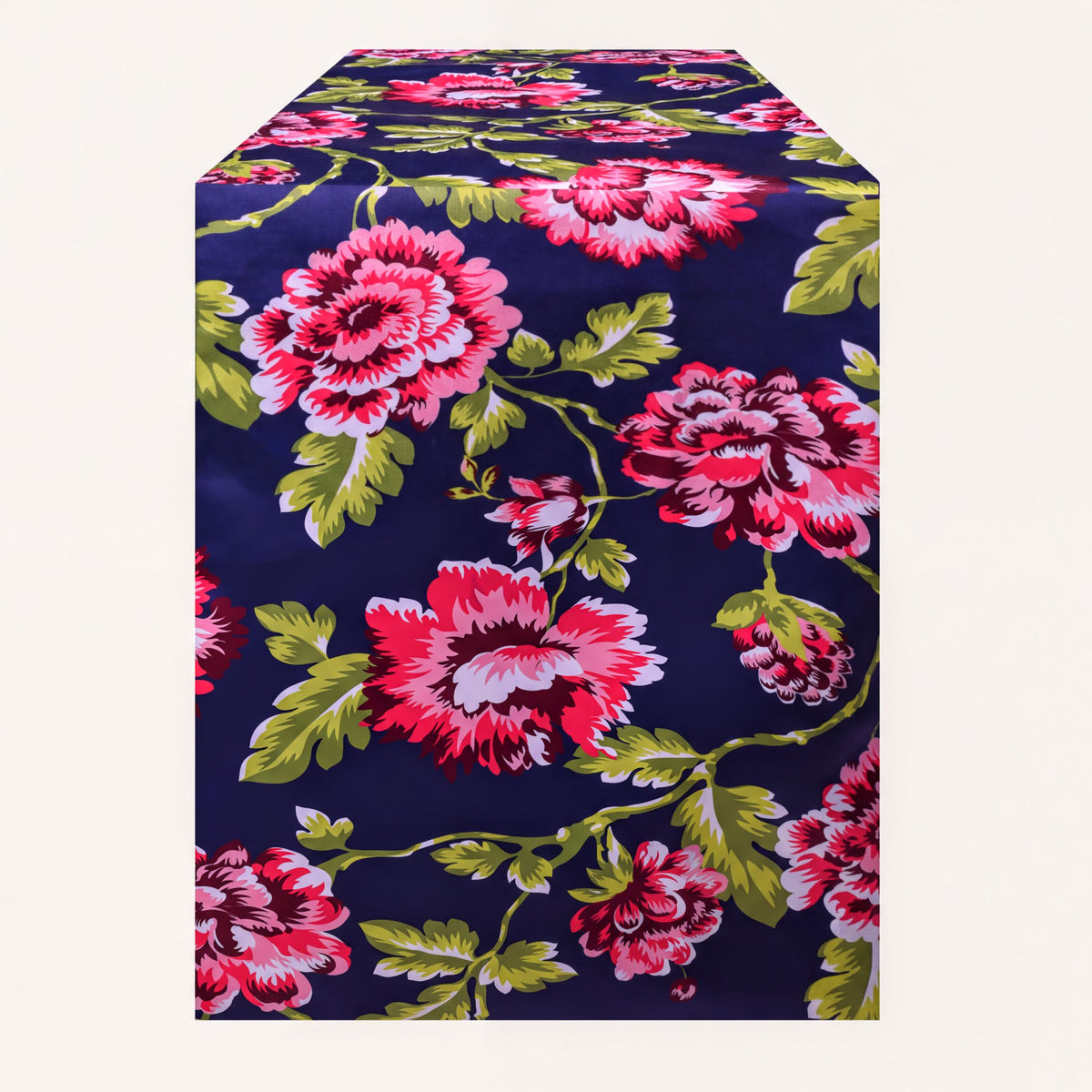 Blue printed table runner from RN-1 with intricate patterns, laid out on a table for a decorative dining setting.