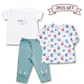 a white t-shirt, a pair of polka dot pajama pants, and a long-sleeved shirt with a bunny pattern.