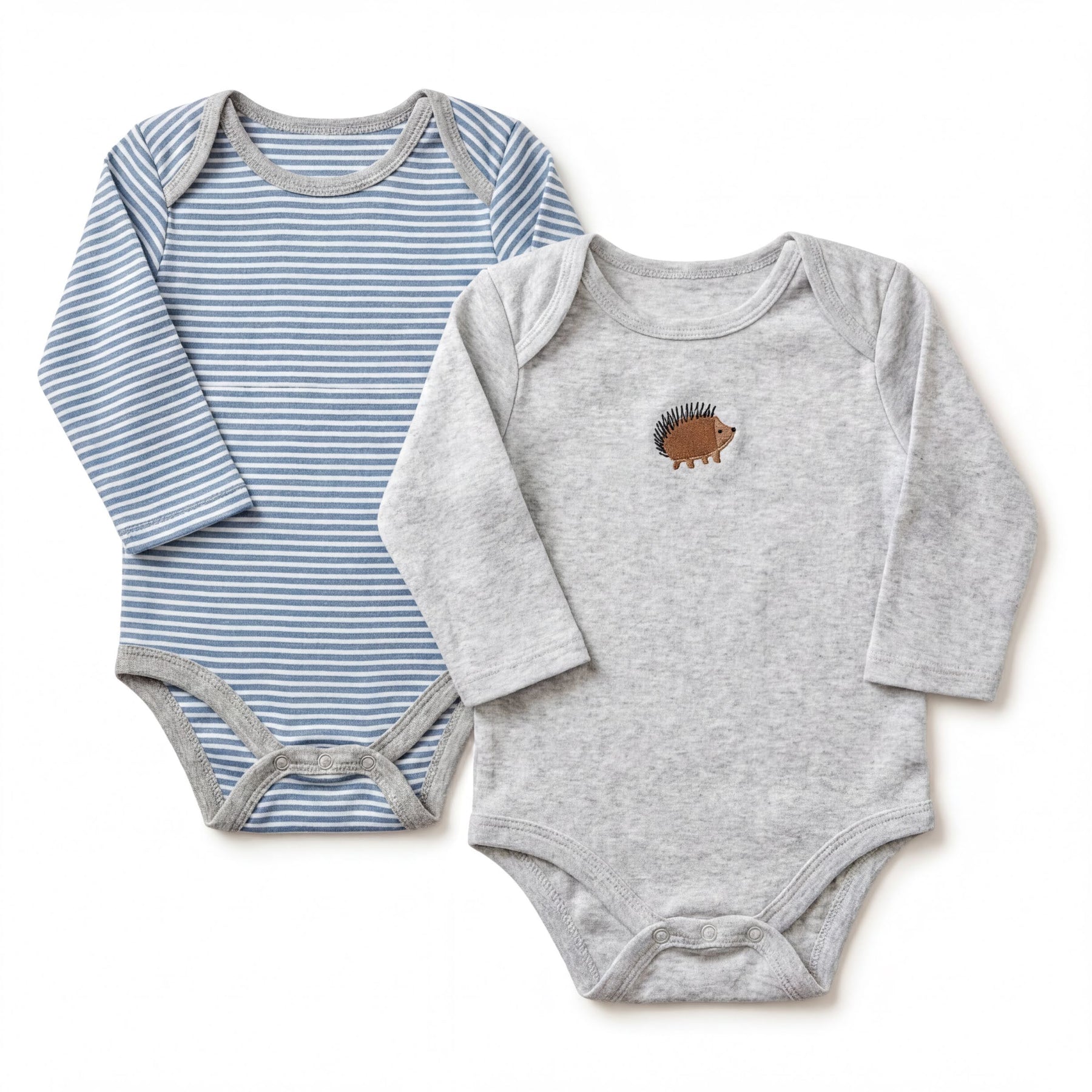 two baby onesies, one striped and one gray, both featuring a small hedgehog design on the front.