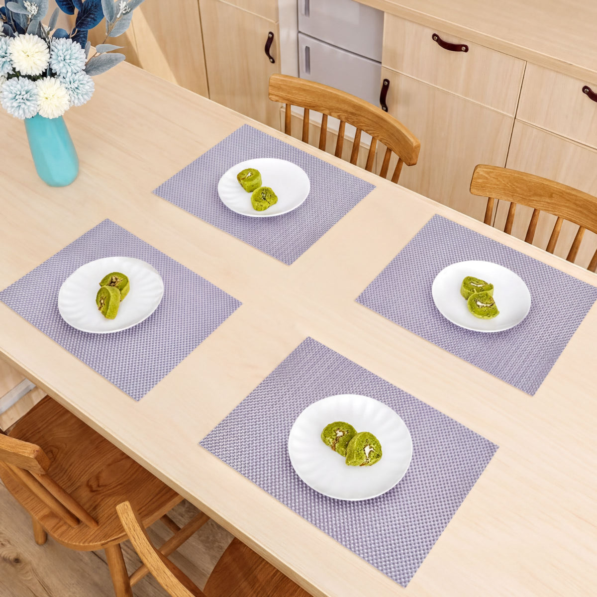 Set of four PVC placemats for dining table, durable and stylish table protectors from the 44339 brand.
