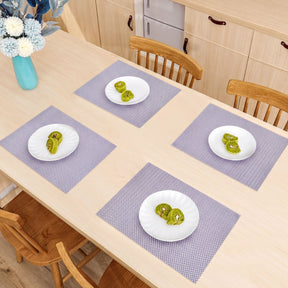 Set of four PVC placemats for dining table, durable and stylish table protectors from the 44339 brand.