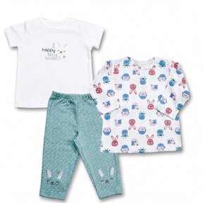 a white t-shirt with a happy bunny design, a pair of green polka dot pajama pants, and a long-sleeved white shirt with a bunny pattern.