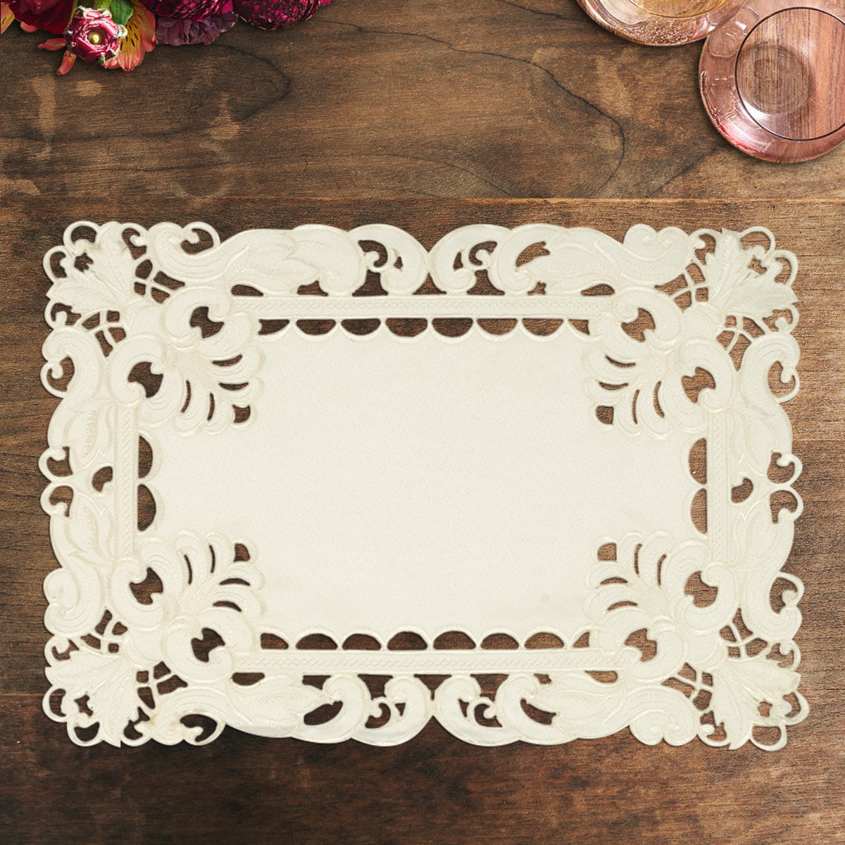 Set of six linen placemats with elegant European embroidery from The Damarcus Collection, showcasing intricate detailed design.