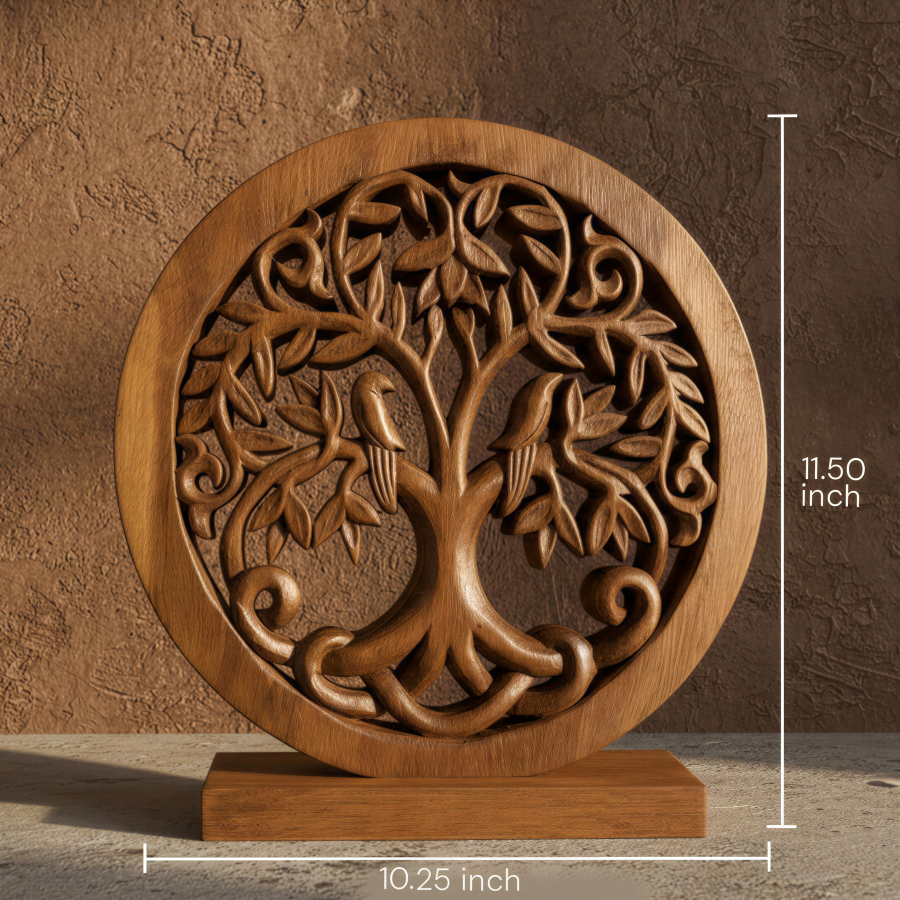 A wooden tree carving with intricate designs, displayed on a wooden stand.