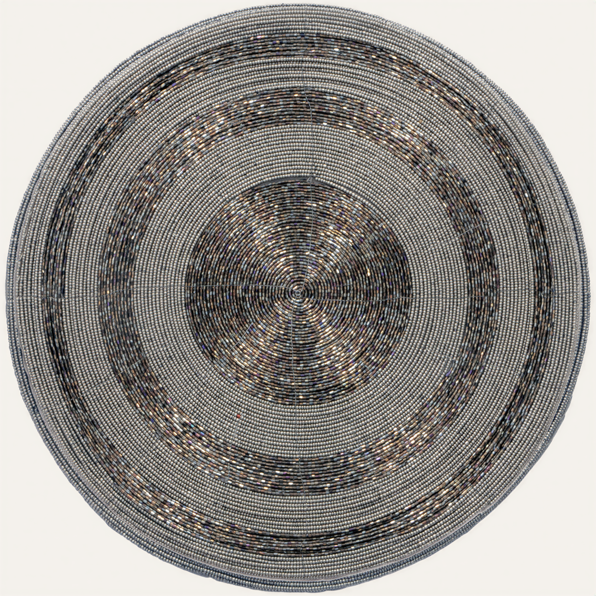 Set of four Vaiga Grace beaded placemats from The Vaiga Collection, elegant 14-inch decorative dining table decor.