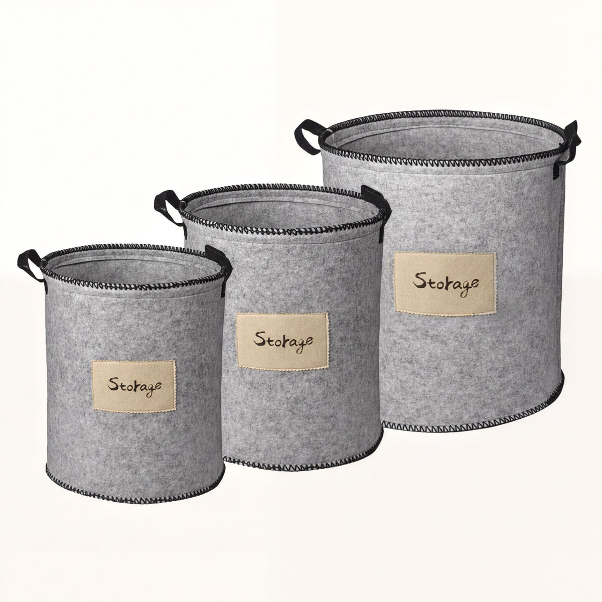 Set of 3 gray felt laundry hampers and storage bins by 4629, featuring soft handles and spacious interior for laundry and organization.