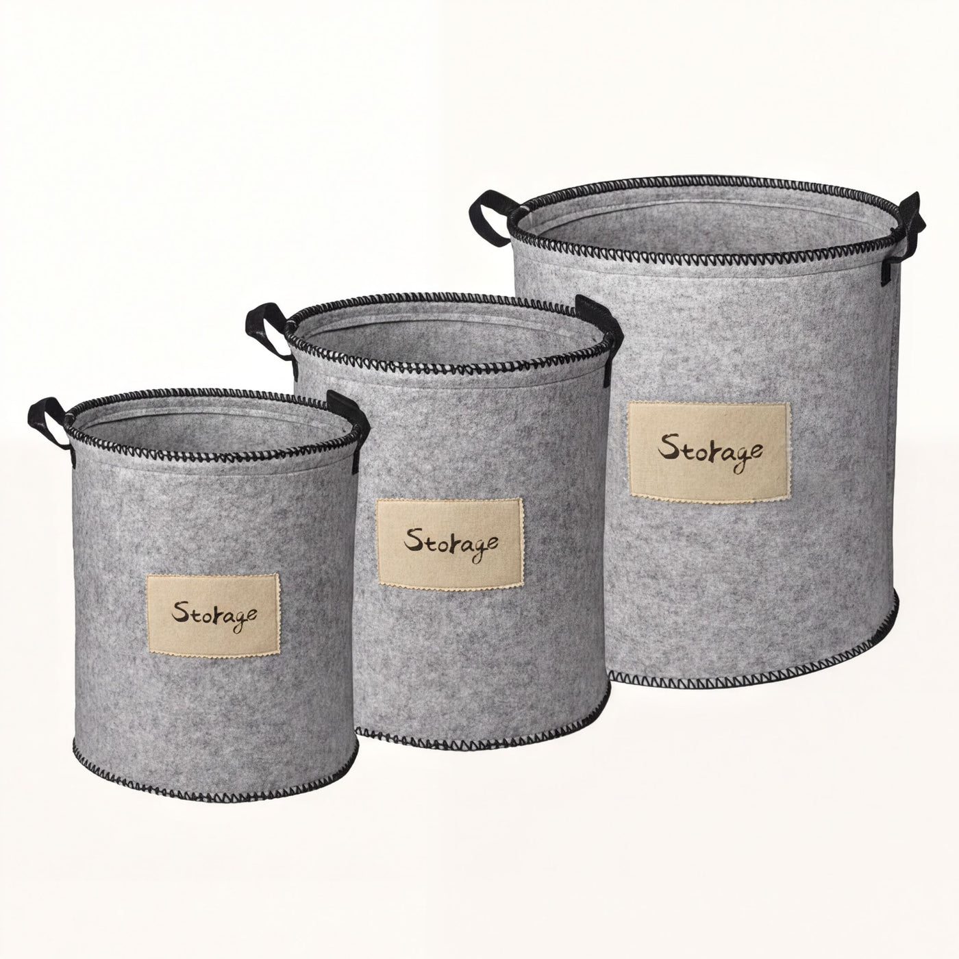 Set of 3 gray felt laundry hampers and storage bins by 4629, featuring soft handles and spacious interior for laundry and organization.
