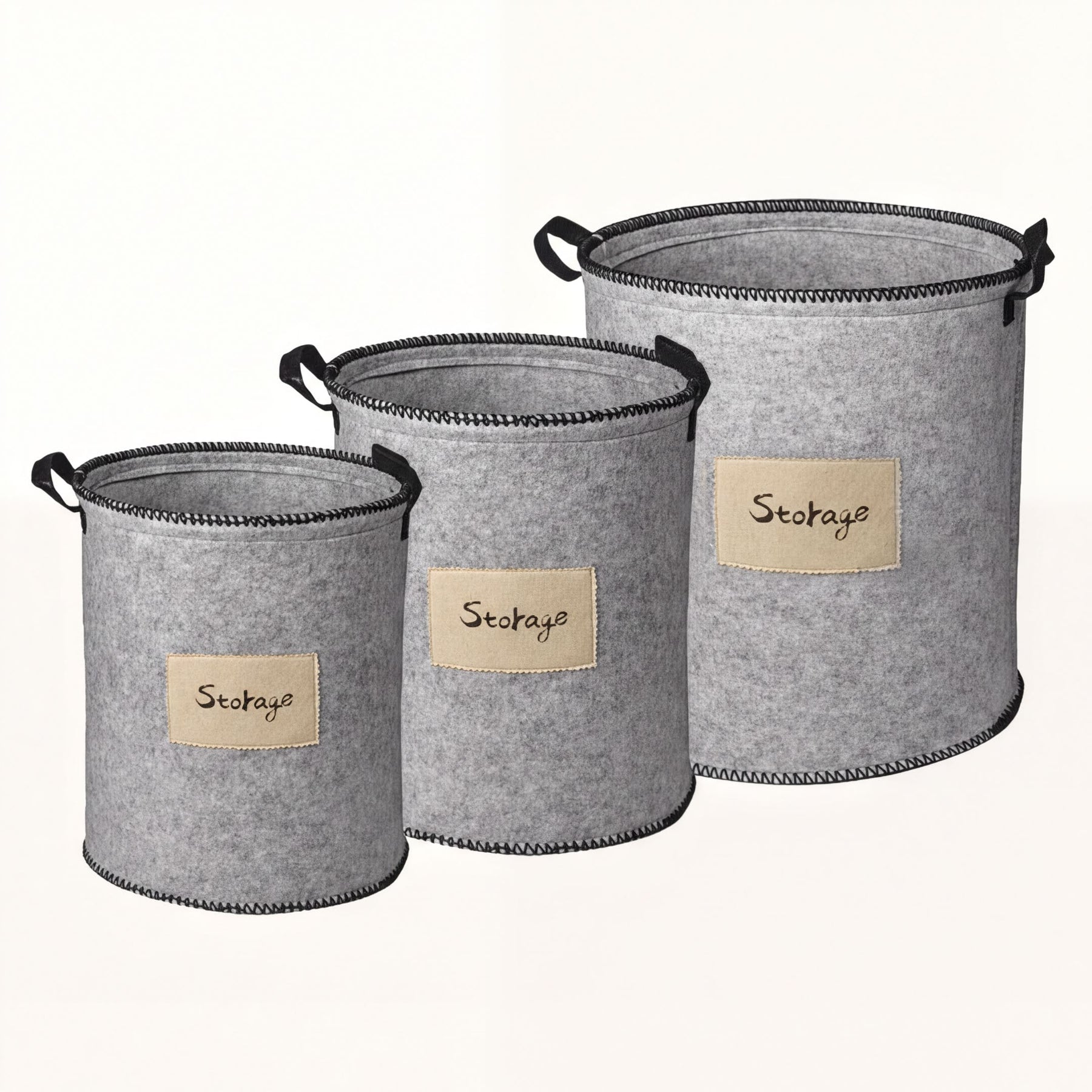 Set of 3 gray felt laundry hampers and storage bins by 4629, featuring soft handles and spacious interior for laundry and organization.