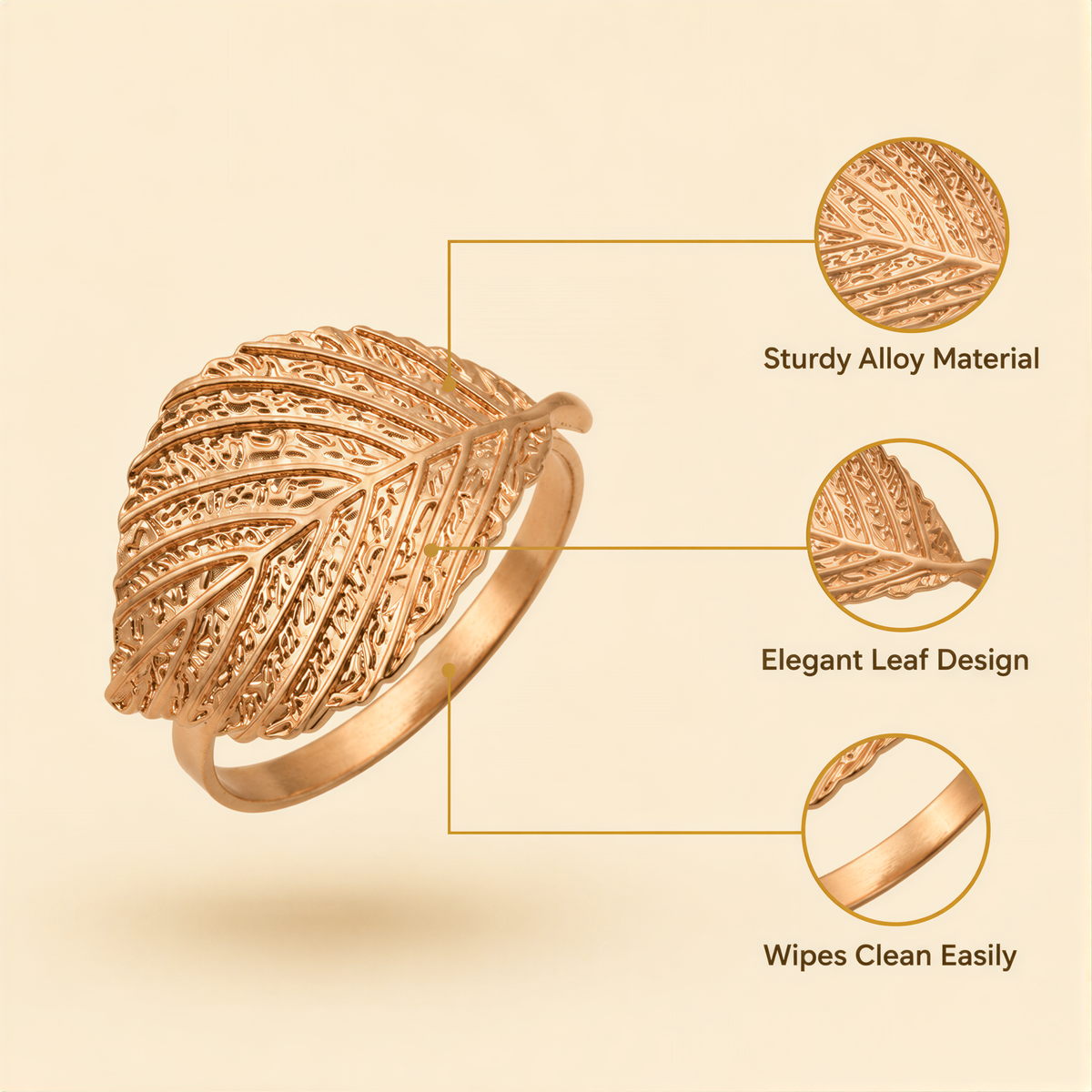 a gold ring with an intricate leaf design.