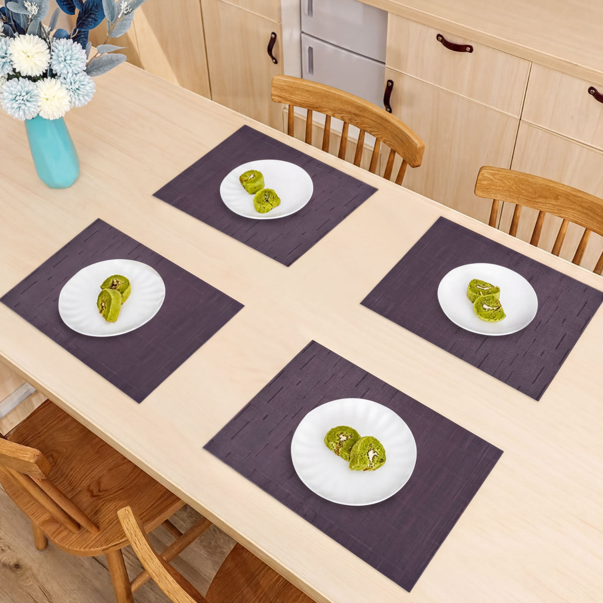 Set of four PVC placemats for dining table by 81972, featuring colorful, durable surface for protecting and decorating the table.