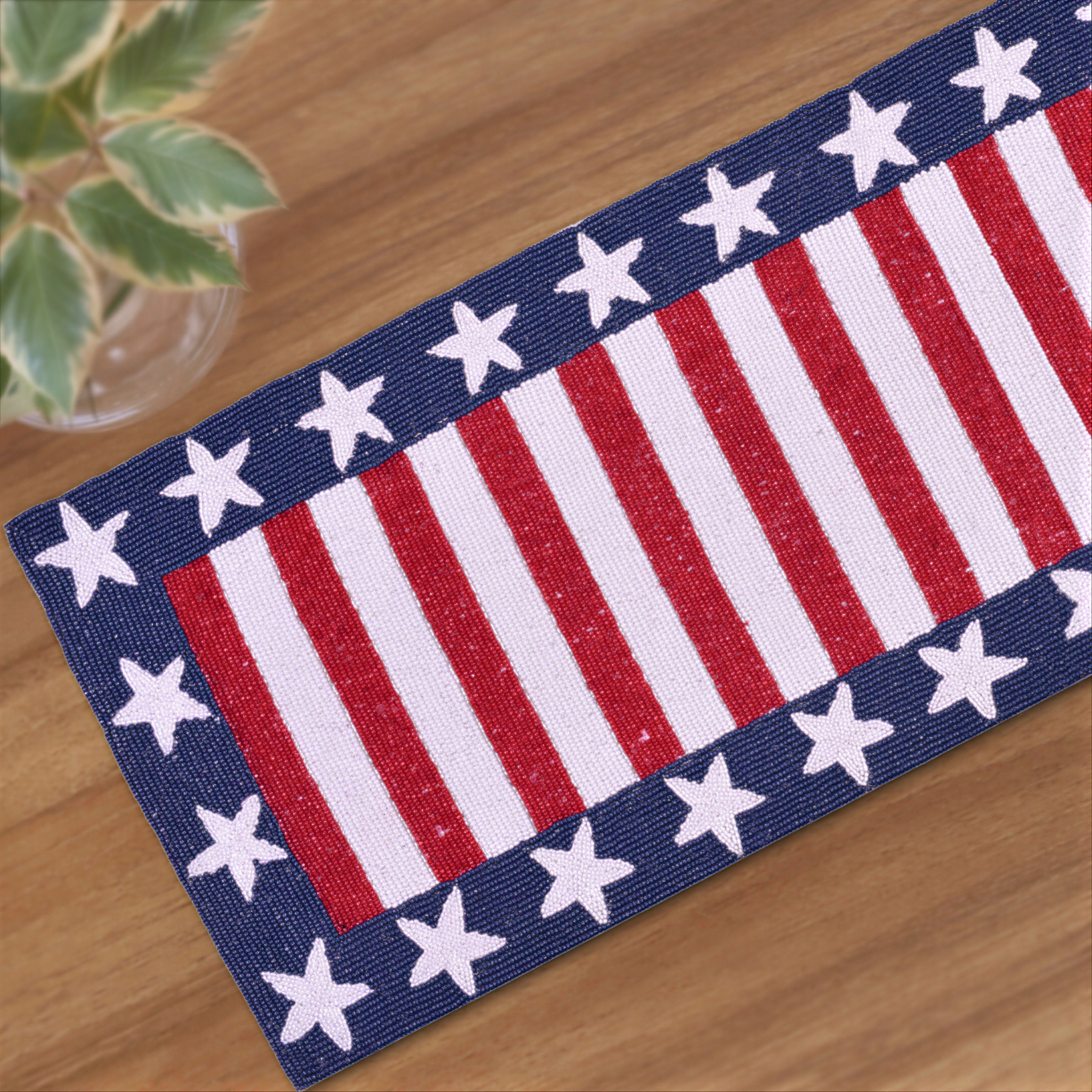 Beaded USA flag table runner, 13x54 inches, featuring patriotic red, white, and blue colors with beaded accents for festive decor.