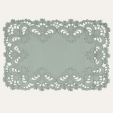 Set of six linen placemats with European embroidery from The Creola Collection, stylish and decorative for dining tables.