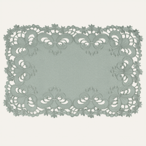 Set of six linen placemats with European embroidery from The Creola Collection, stylish and decorative for dining tables.