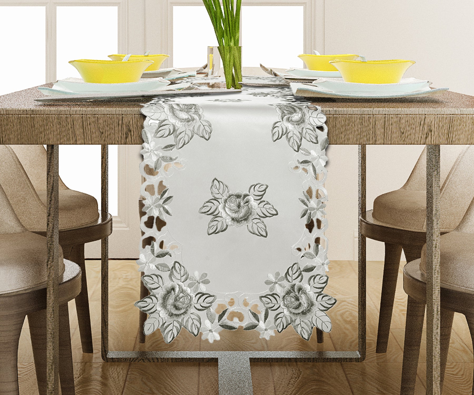 Linen table runner with intricate European embroidery, showcasing detailed craftsmanship on a stylish dining table.